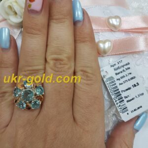 Срібне кільце 925 проби із вставками золота 375 проби.