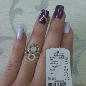 2421034640_serebryanoe-koltso-925.jpg Срібне кільце 925 проби з золотими вставками 375 проби.