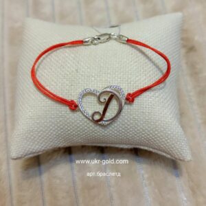 Червона ниточка на руку з сріблом 925 проби і пластинами золота 375 проби.