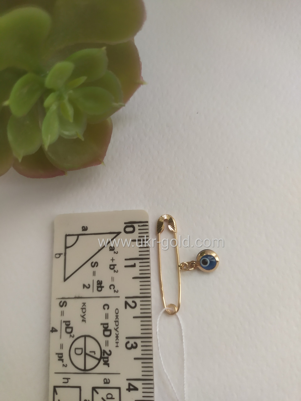 Золота шпилька в червоному золоті 585 проби з амулетом від зглазу