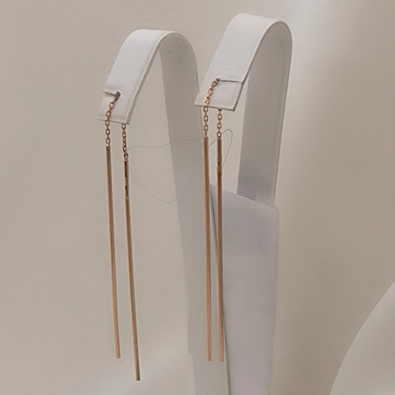 Золоті сережки протяжки в червоному золоті 585 проби