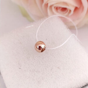 Золотий кулон шар