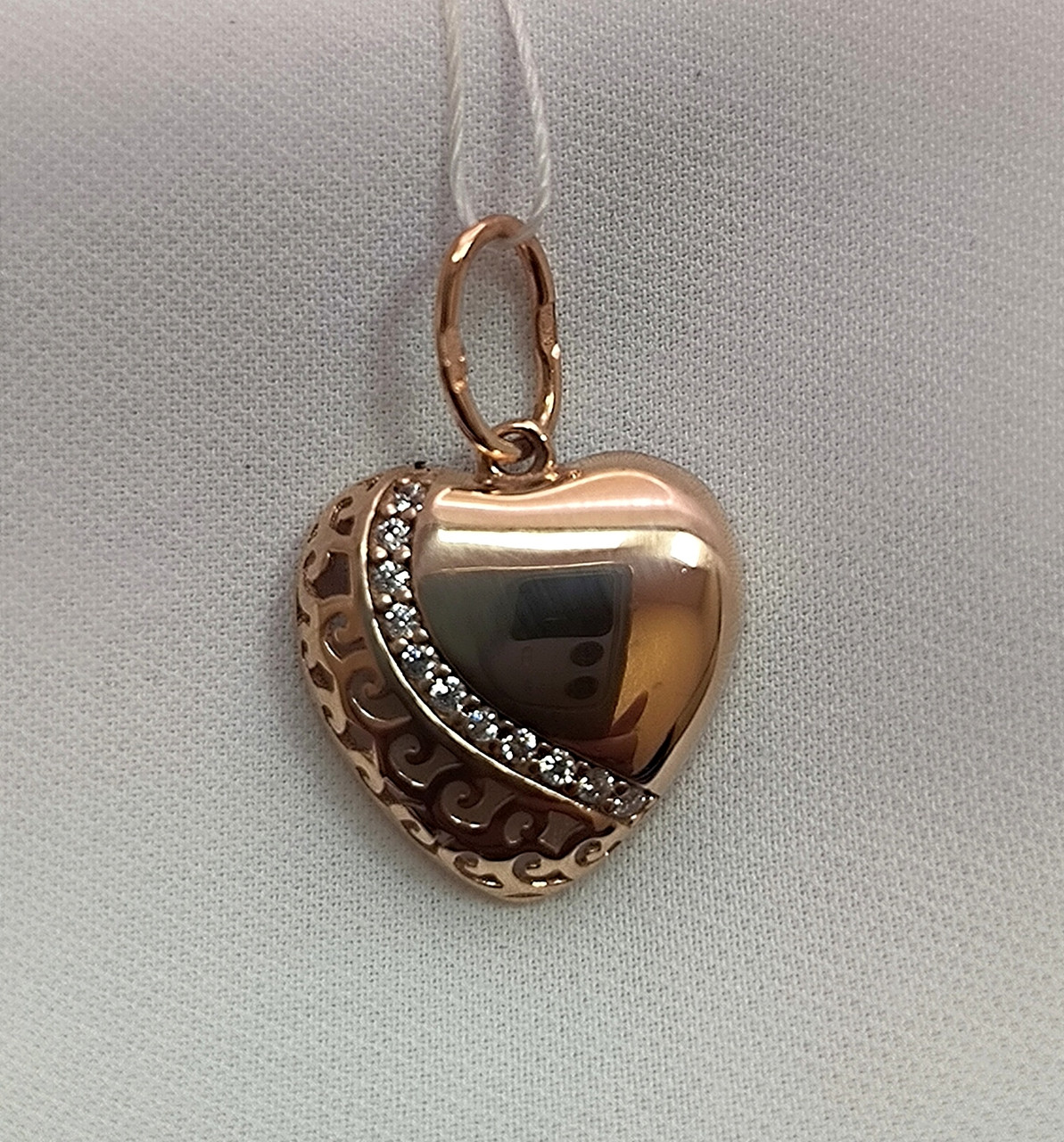 Золотий кулон серця