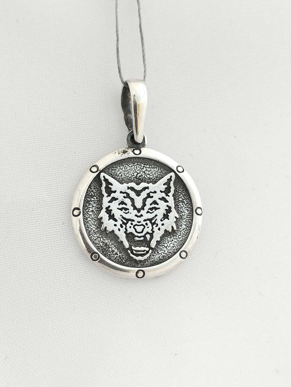 Срібний кулон вовк