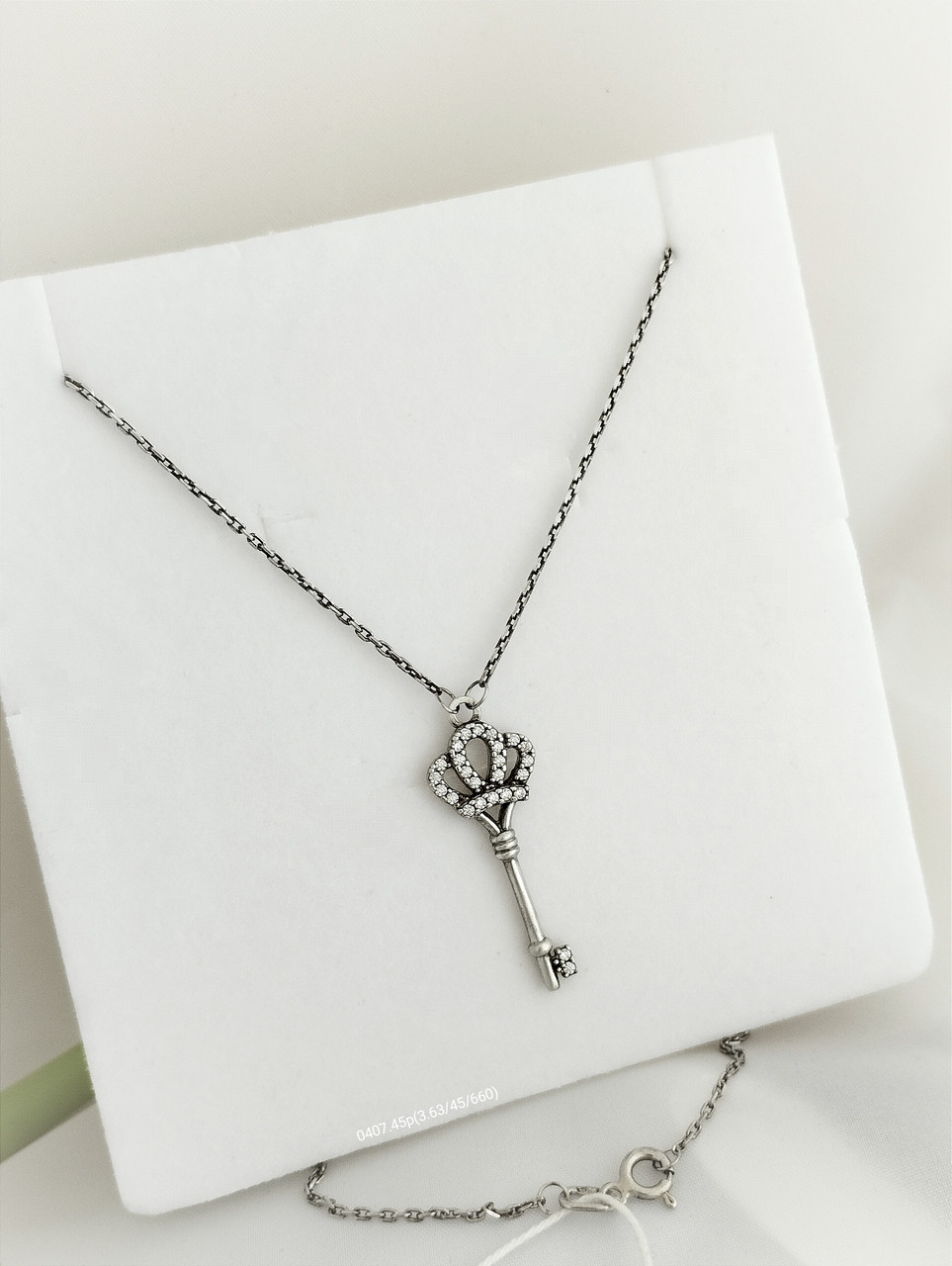 Срібний кольє ключ
