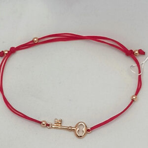 5349070792_zolotoj-braslet-tekstilnaya.jpg Текстильна нитка на руку зі вставками золота 585 проби