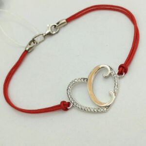 Червона ниточка (браслет) на руку.