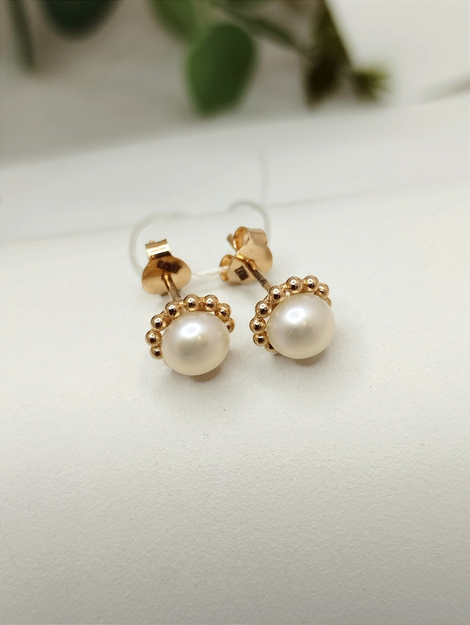Золоті сережки з перлами