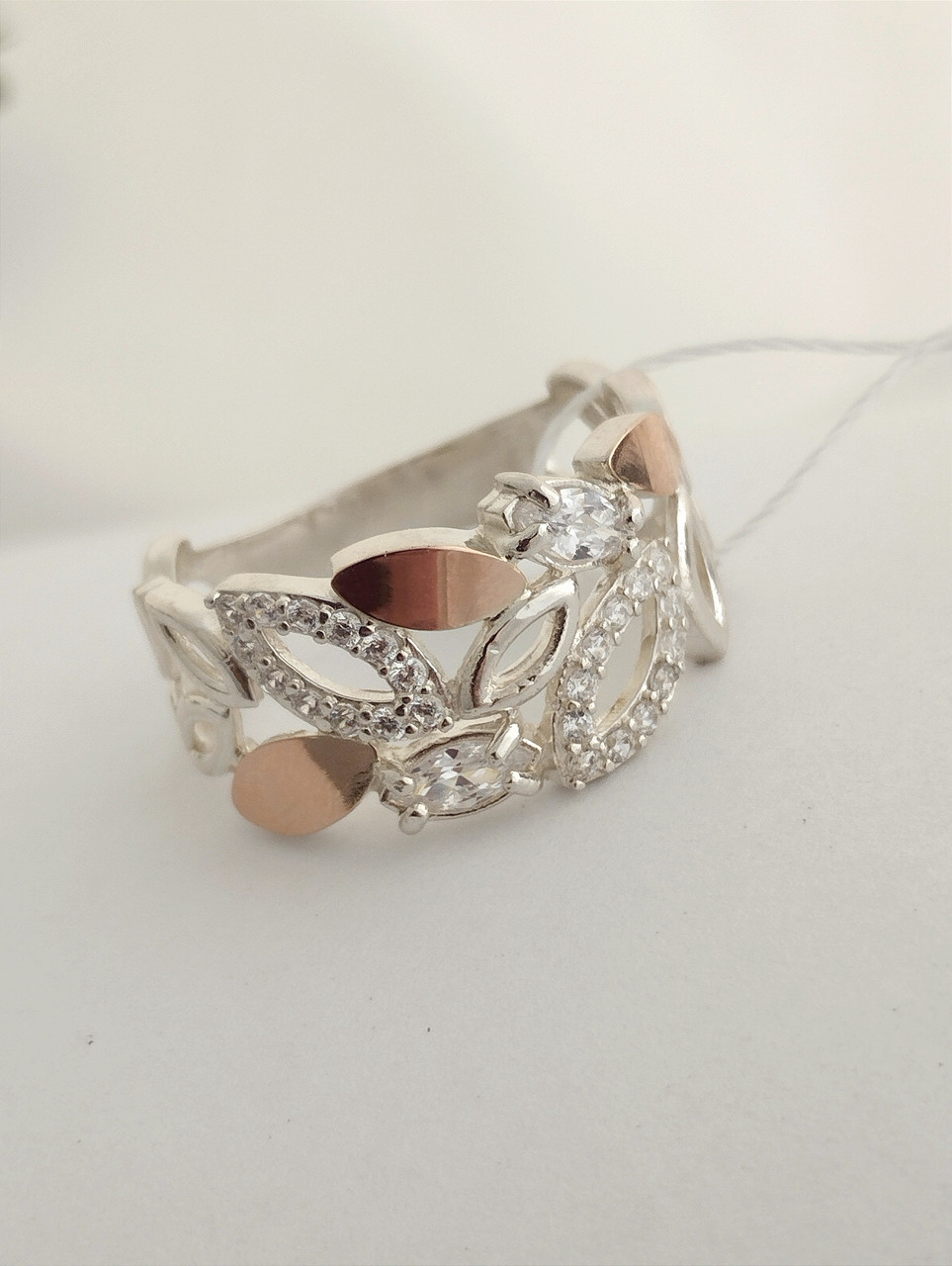 Срібне кільце із золотими пластинами