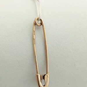 Золота шпилька