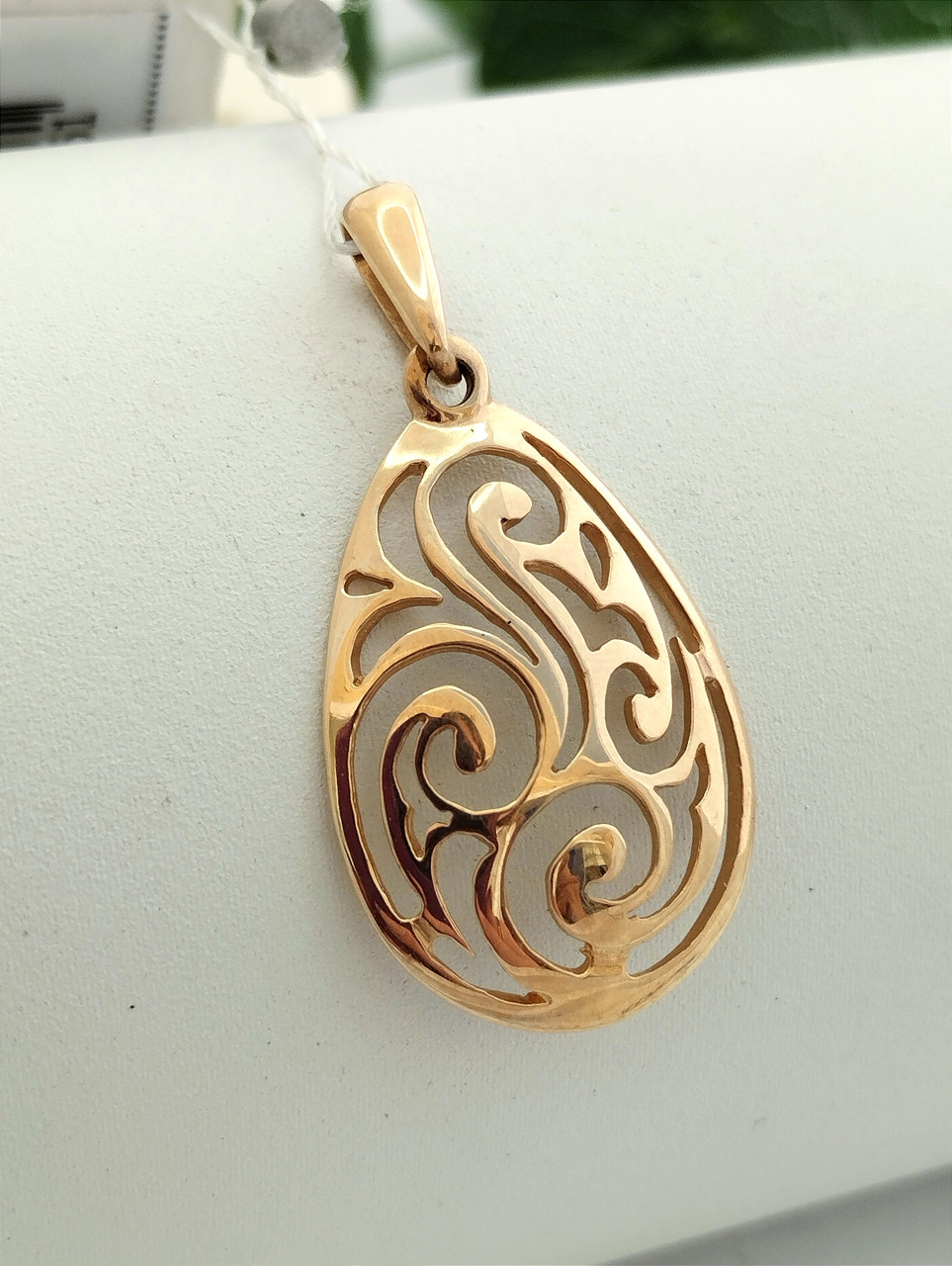 Золотий кулон