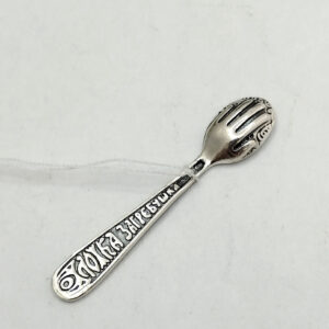 Срібний сувенір загребушка