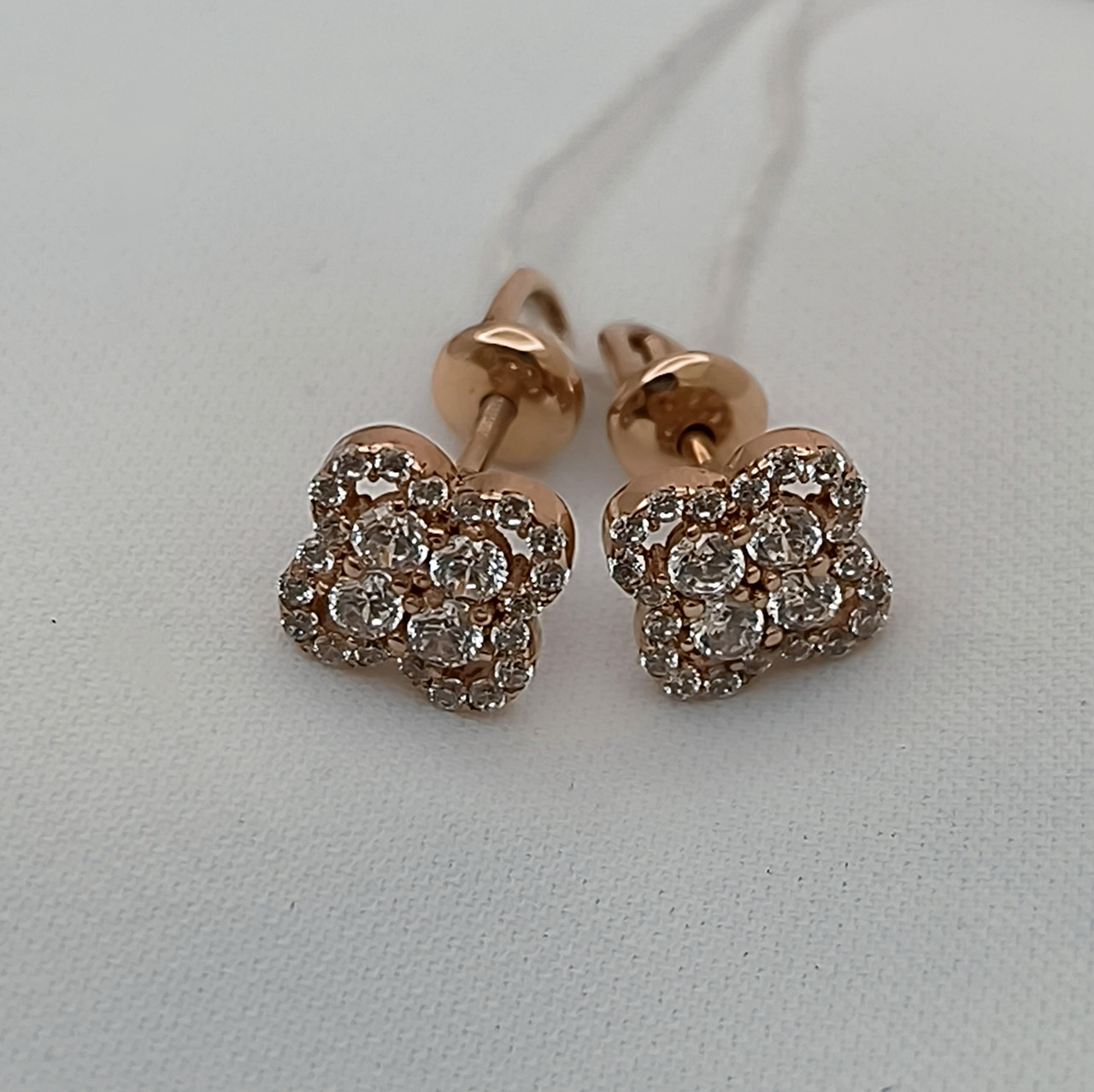 Золоті сережки гвоздики 585 проби зі вставками цирконію