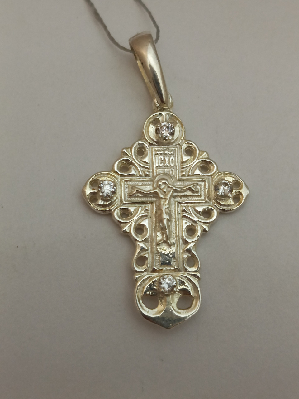 Срібний хрестик із розп'яттям і цирконієм